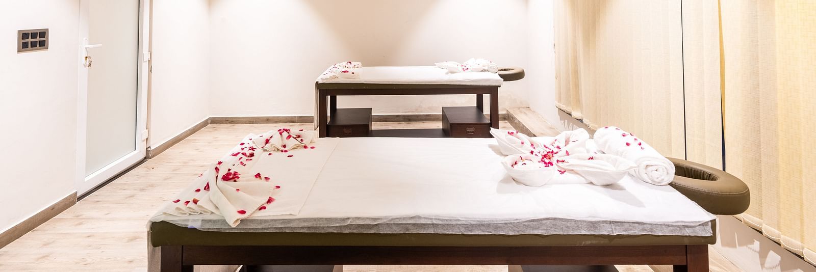 Spa at DLS Divine River Resort and Spa with spa beds and warm lighting